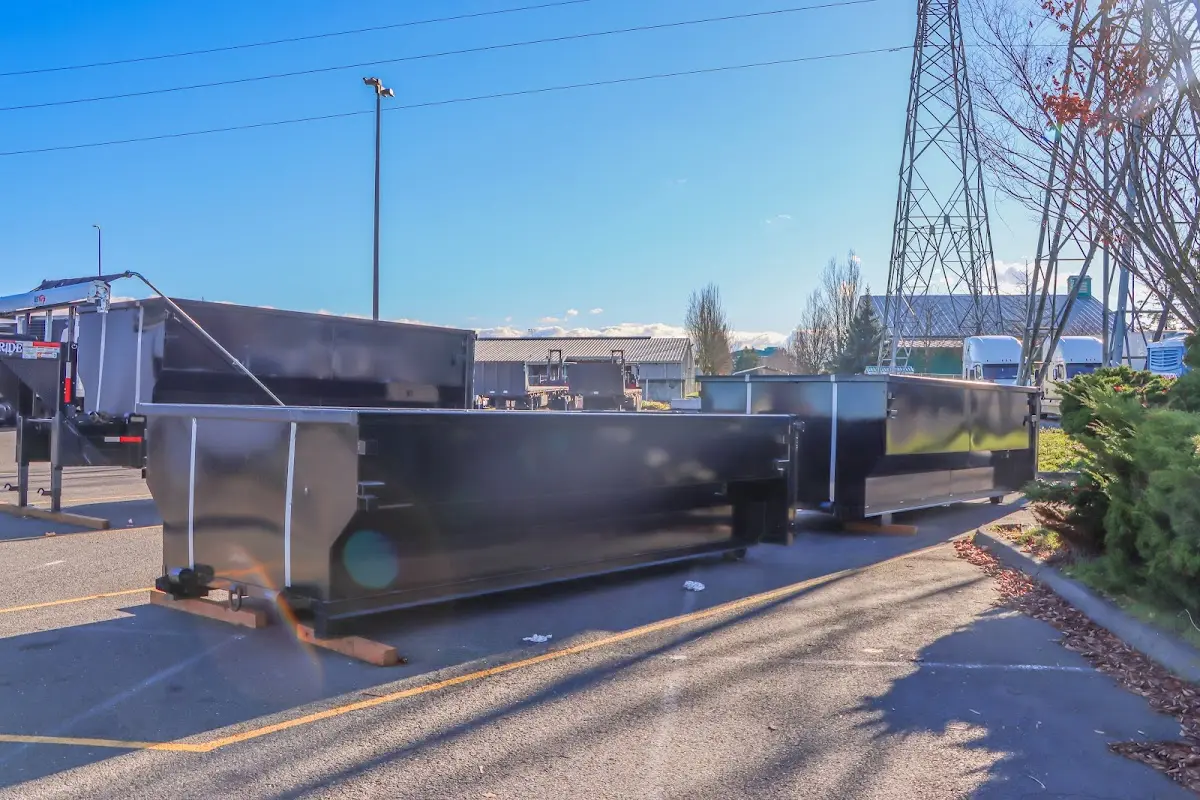 Roll-off dumpster ready for waste disposal at job site for 15 Yard Dumpster Rental in Beloit